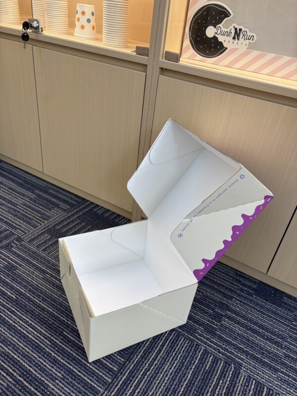 custom printed cake box with logo held in hand